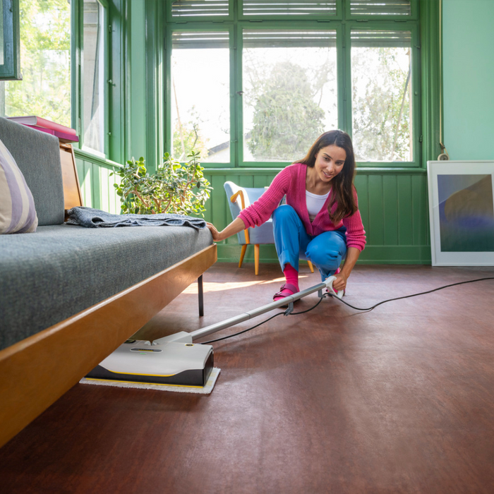 Steam mop cleaning sealed wooden flooring