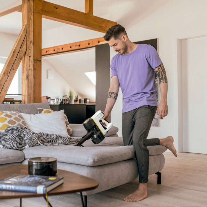 Karcher VC 4 Cordless Premium myHome Battery-Power Vacuum Cleaner Vacuuming sofa
