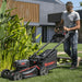 Kress 60V 46 cm Brushless Self-Propelled Lawn Mower in use