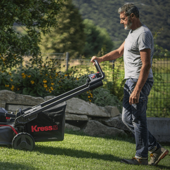 Kress KG760E.9 60V 51 cm Brushless Self-Propelled Lawn Mower Person is Using Lawn Mower