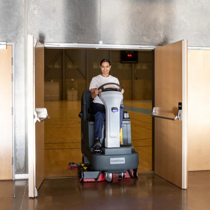 Nilfisk SC4000 860D battery powered rider scrubber dryer with disc deck providing reliable and high-capacity floor cleaning 