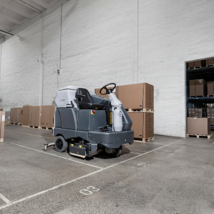 Nilfisk SC6500 1100D battery ride-on scrubber dryer providing high capacity scrubbing and drying for large warehouse and factory floors