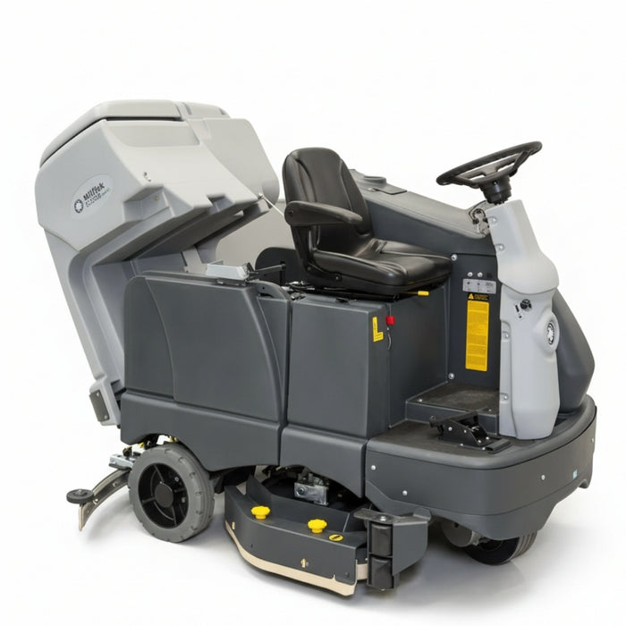 Side view of Nilfisk SC6500 1300D battery ride-on scrubber dryer showcasing large disc deck for high productivity floor cleaning