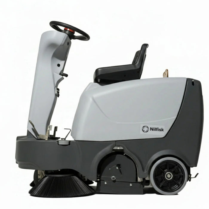 Operator driving Nilfisk SR1000S mid-size ride-on battery powered sweeper delivering powerful cleaning for indoor and outdoor spaces