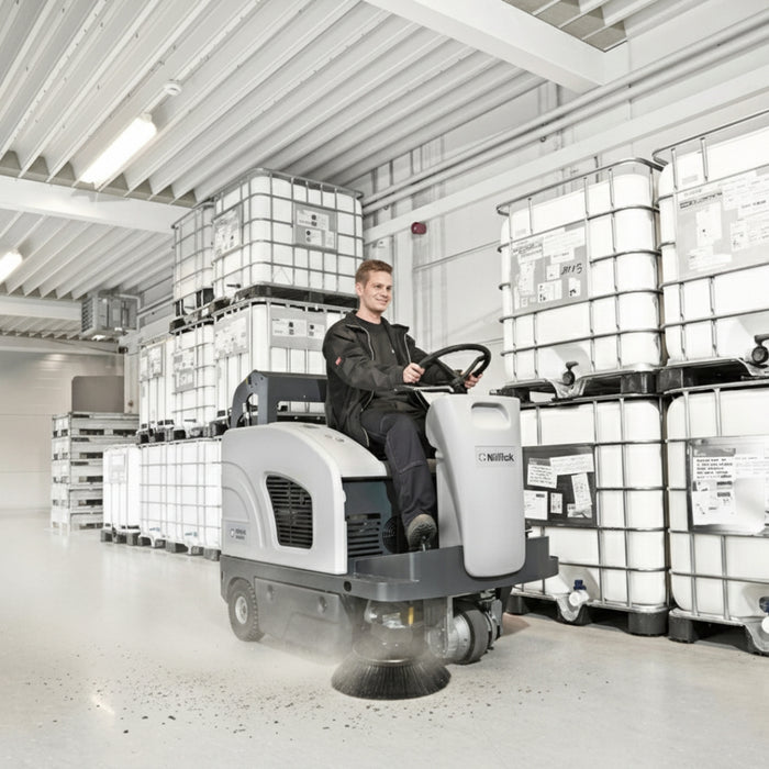Nilfisk SW4000 high productivity battery ride-on sweeper delivering strong sweeping performance for mid-size industrial and commercial floors