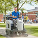 Nilfisk SW4000 battery powered mid-size ride-on sweeper designed for efficient dust and debris removal in commercial and industrial spaces